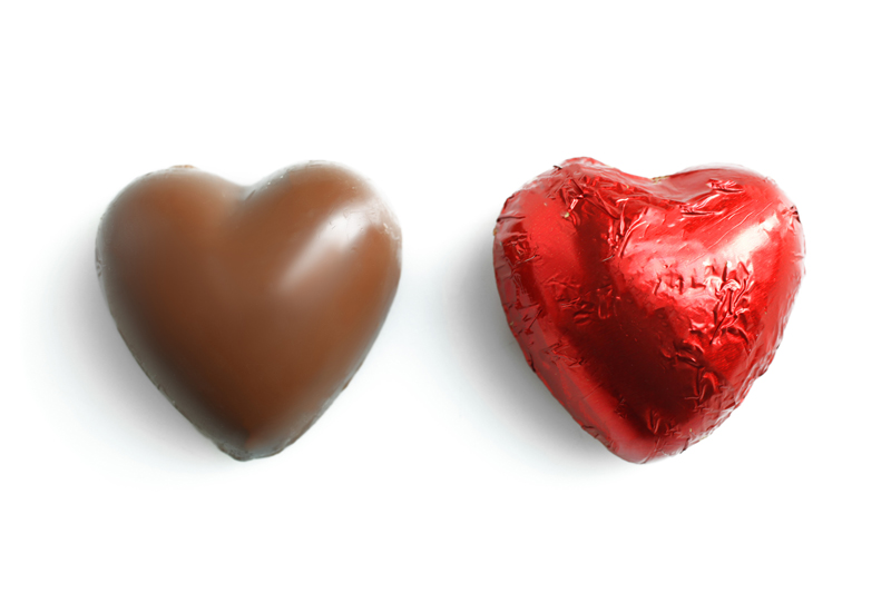 2 Dove heart chocolates - one wrapped in red foil